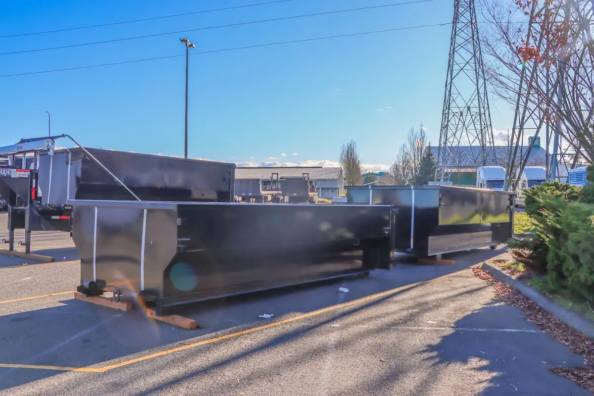 Roll-off dumpster ready for waste disposal at job site for 12 Yard Dumpster Rental in Sudley
